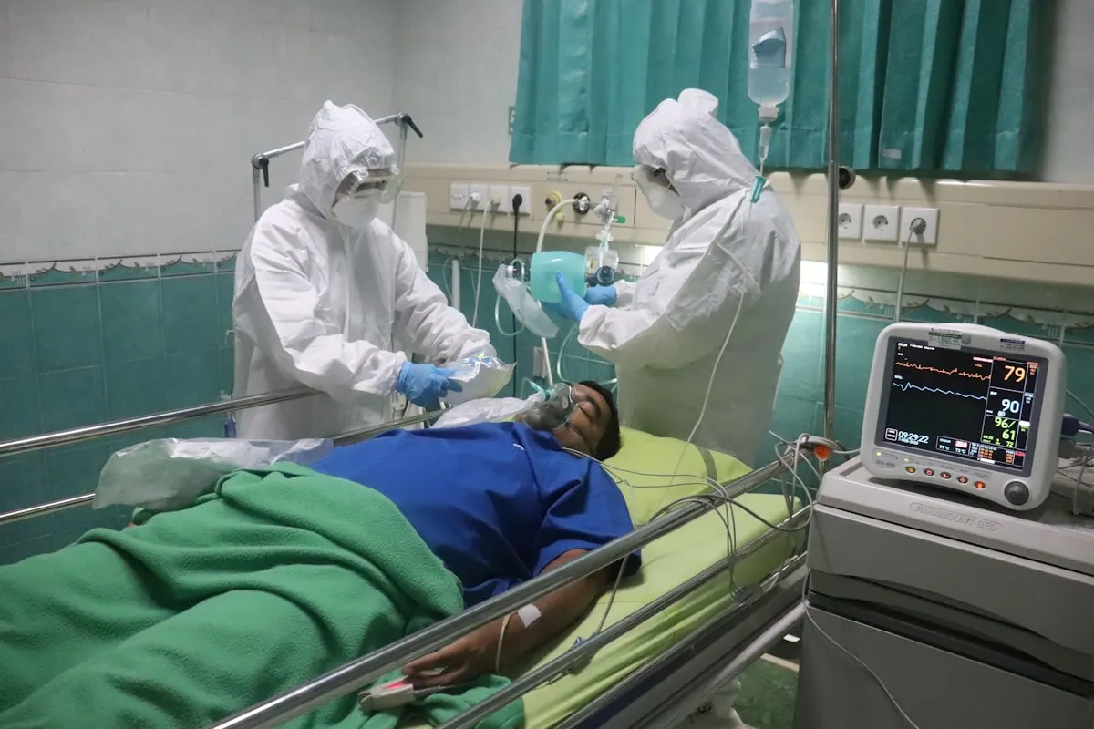 Physiotherapist working with a patient on gentle exercises for rheumatoid arthritis management