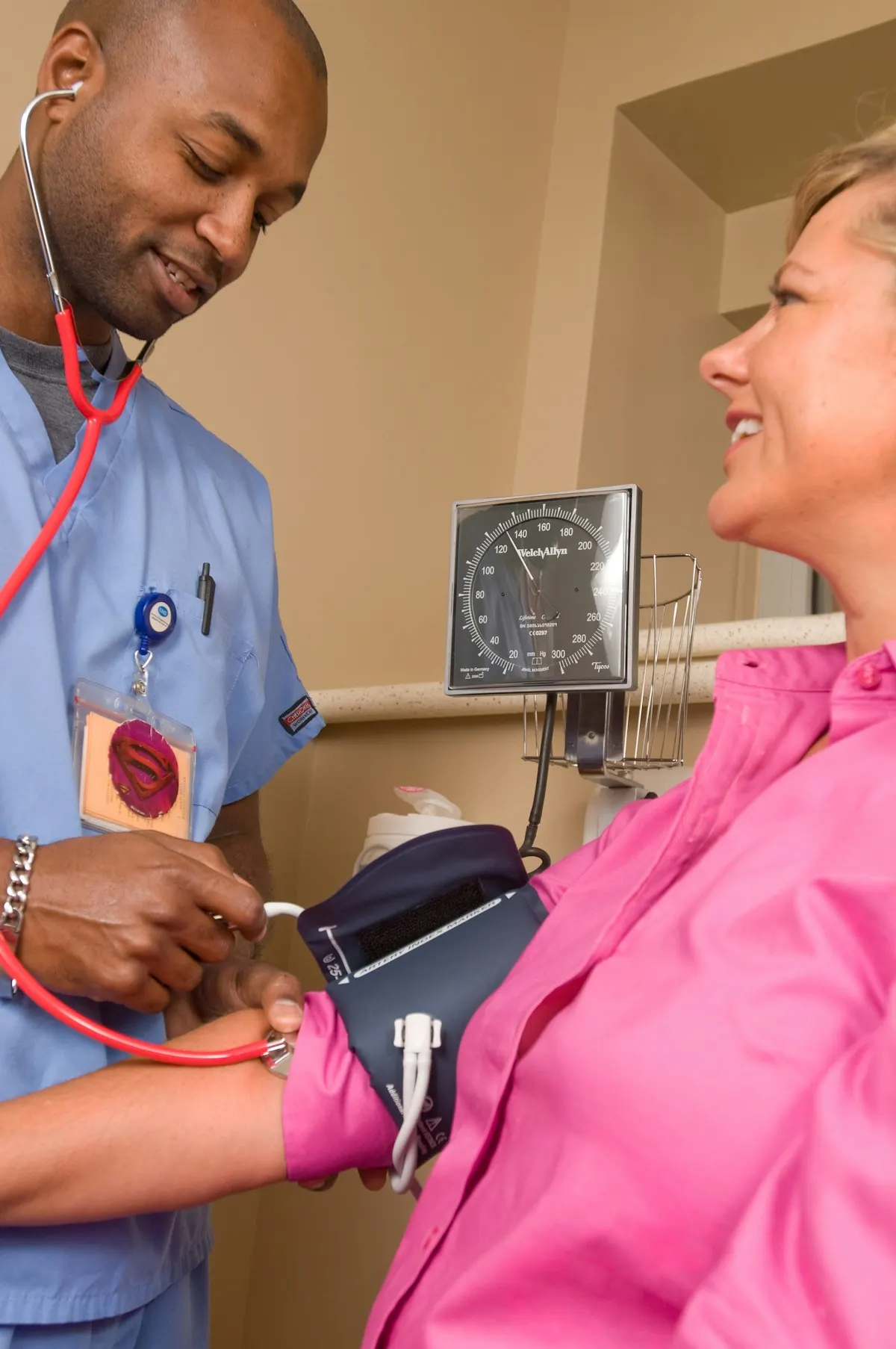 Physiotherapist performing vestibular assessment and eye movement testing on a patient with dizziness